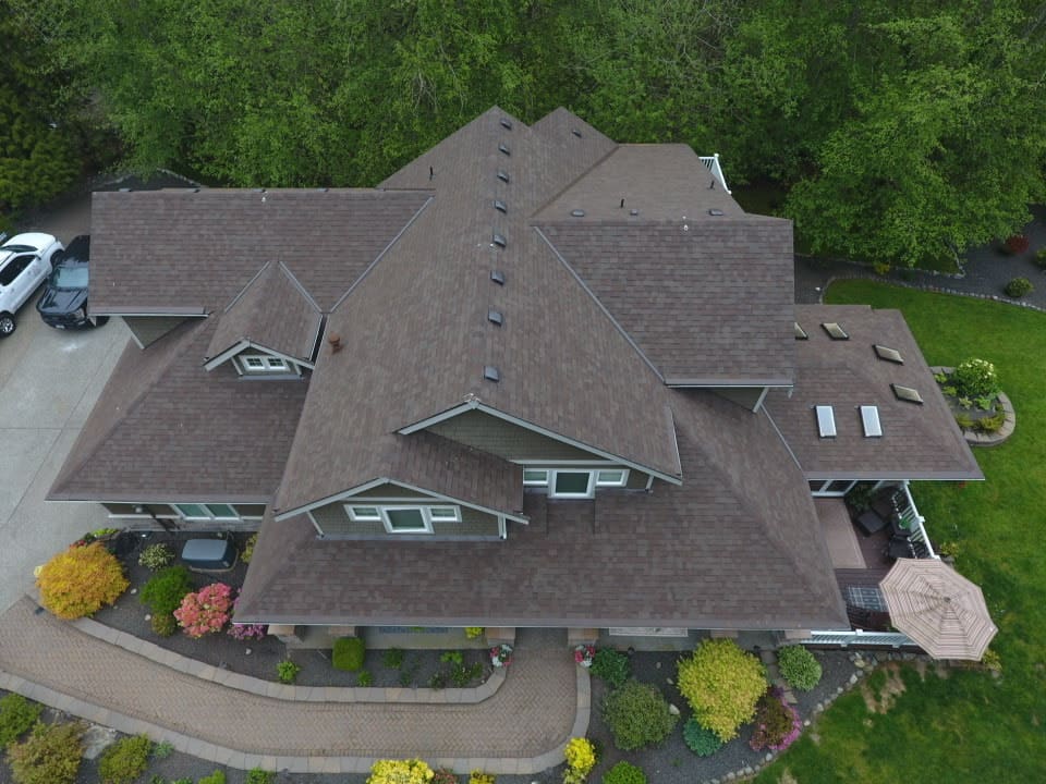 Drone aerial of a Malarkey Vista Midnight Black roof we installed in Gig Harbor