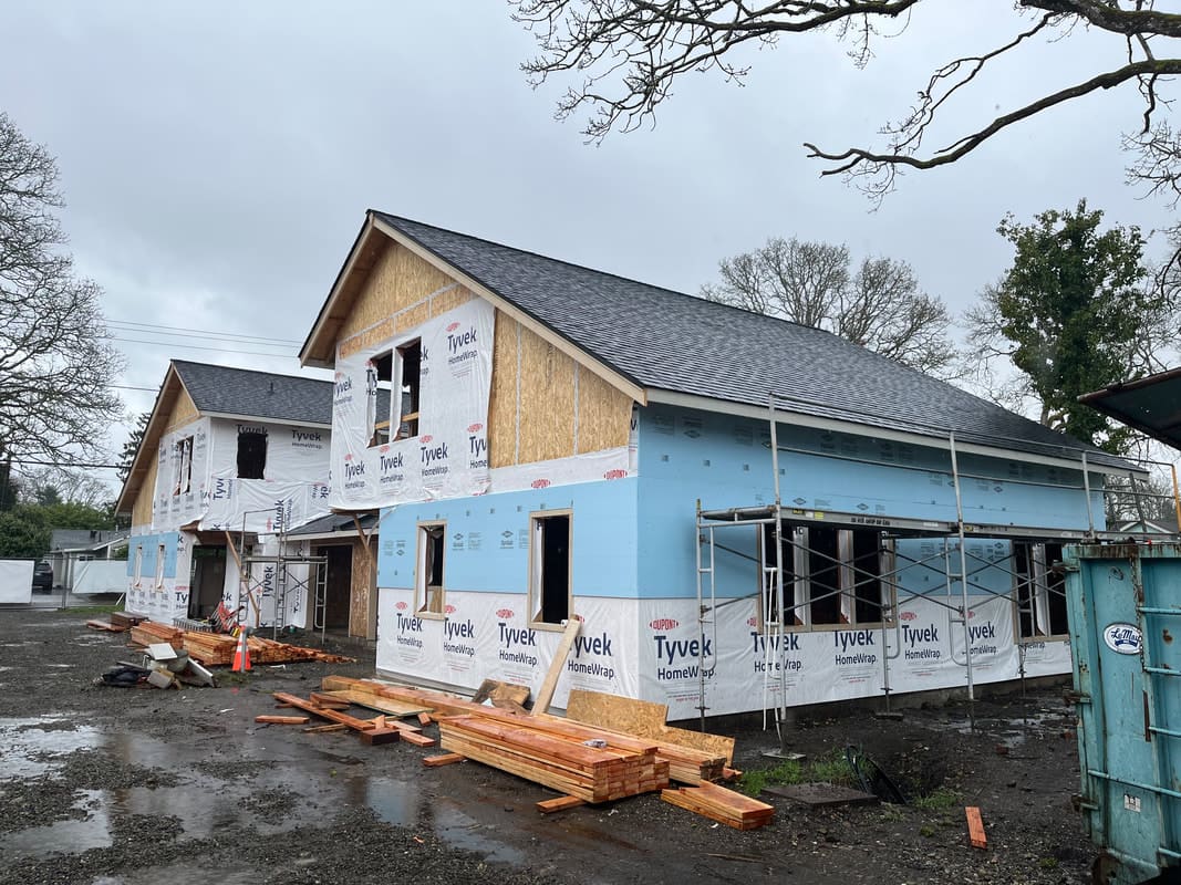 Habitat for Humanity duplex · CertainTeed Landmark Pro, donated — Tacoma